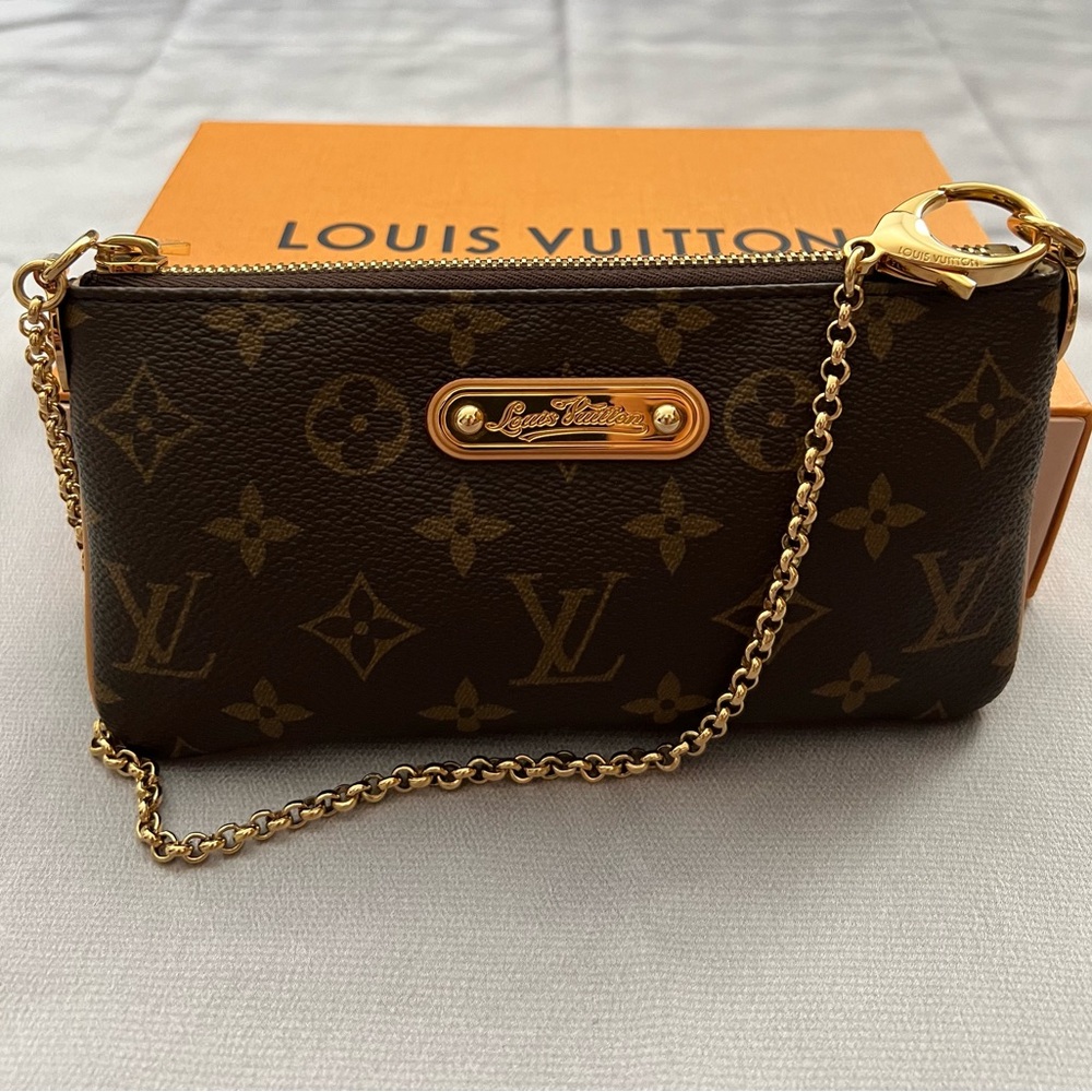 Authentic Louis Vuitton preloved mini  pochette